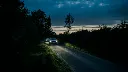 road-front-two-cars.webp